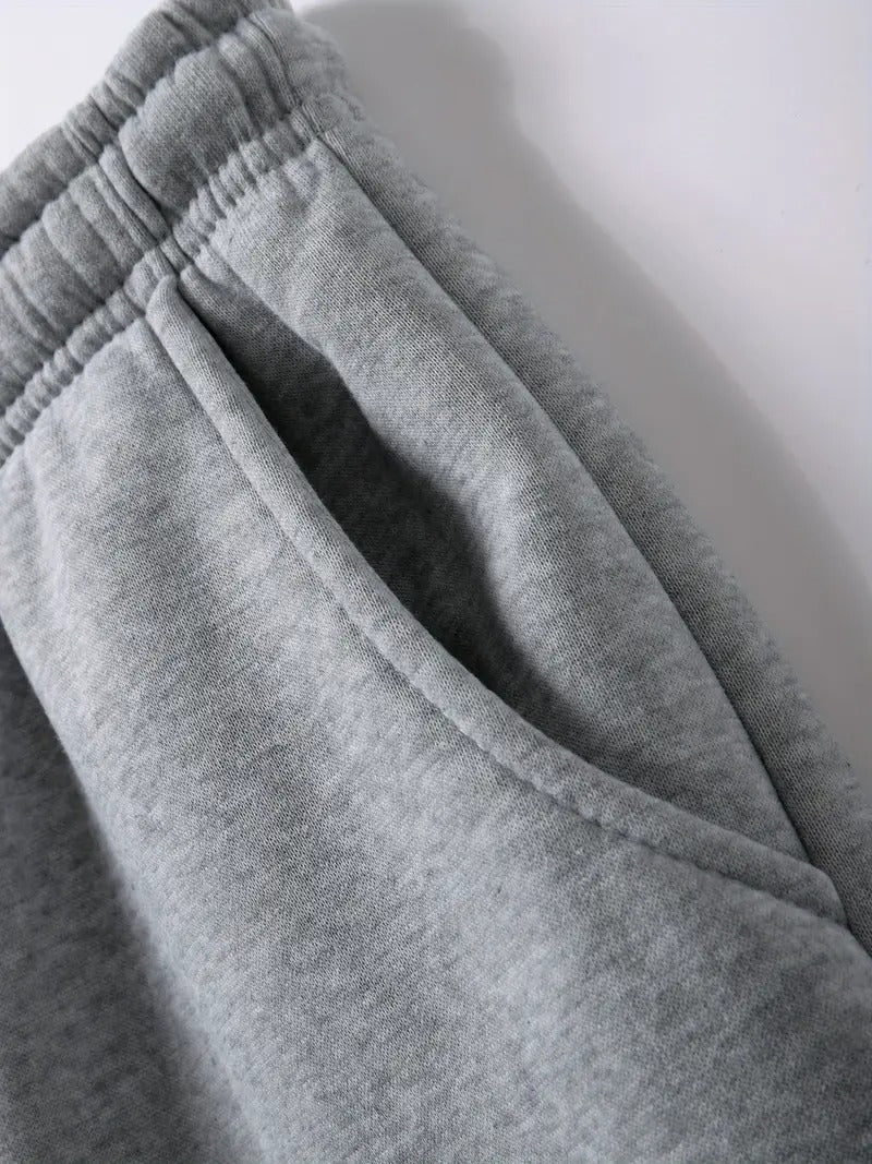 Close-up of gray sweatpants